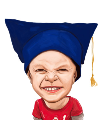 Head and Shoulders portrait of a boy with huge smile and graduation hat